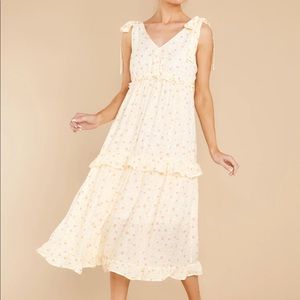 Yellow tiered midi dress from red dress boutique